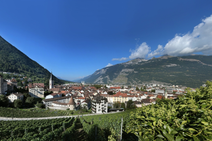 Alpine town of Chur with its local mountains Brambrüesch (left) and Calanda (right)